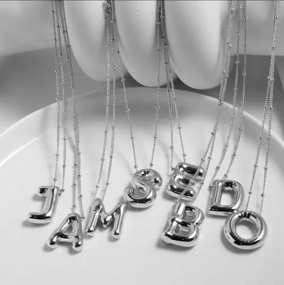 Silver and gold letter necklace